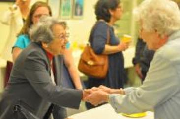 Helen Greeting Guests