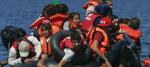 Syrian and Afghan refugees on raft reaching the Greek island of Lesbos, September 13, 2015. Reuters 