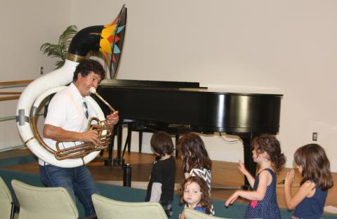 Ryan Zawel Leading Children with His Tuba